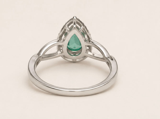 Emerald Twist Halo Ring