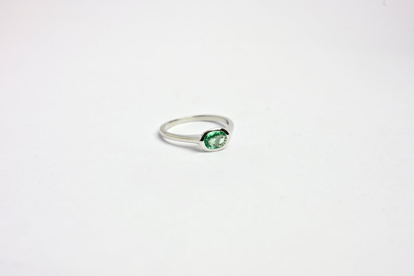 Oval Emerald Bezel Ring