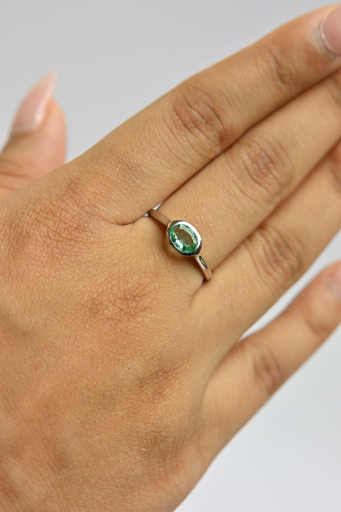 Oval Emerald Bezel Ring