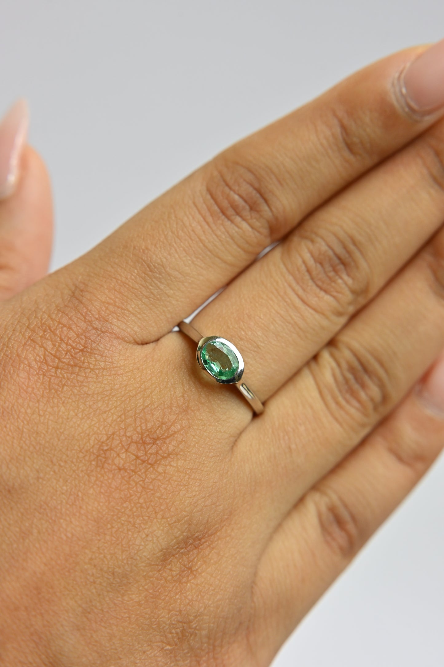 Oval Emerald Bezel Ring